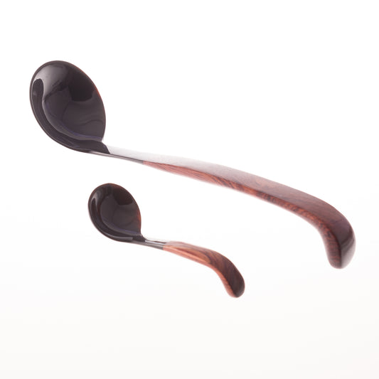 A small and large ladle made from water buffalo horn with a rosewood handle