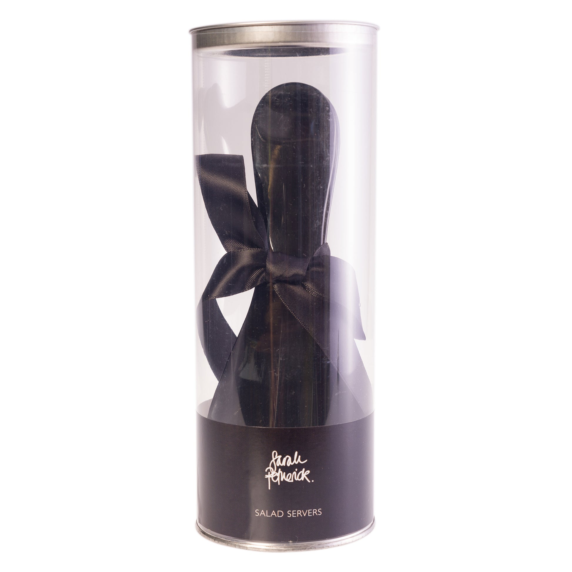 Black water buffalo horn salad servers in a clear tube
