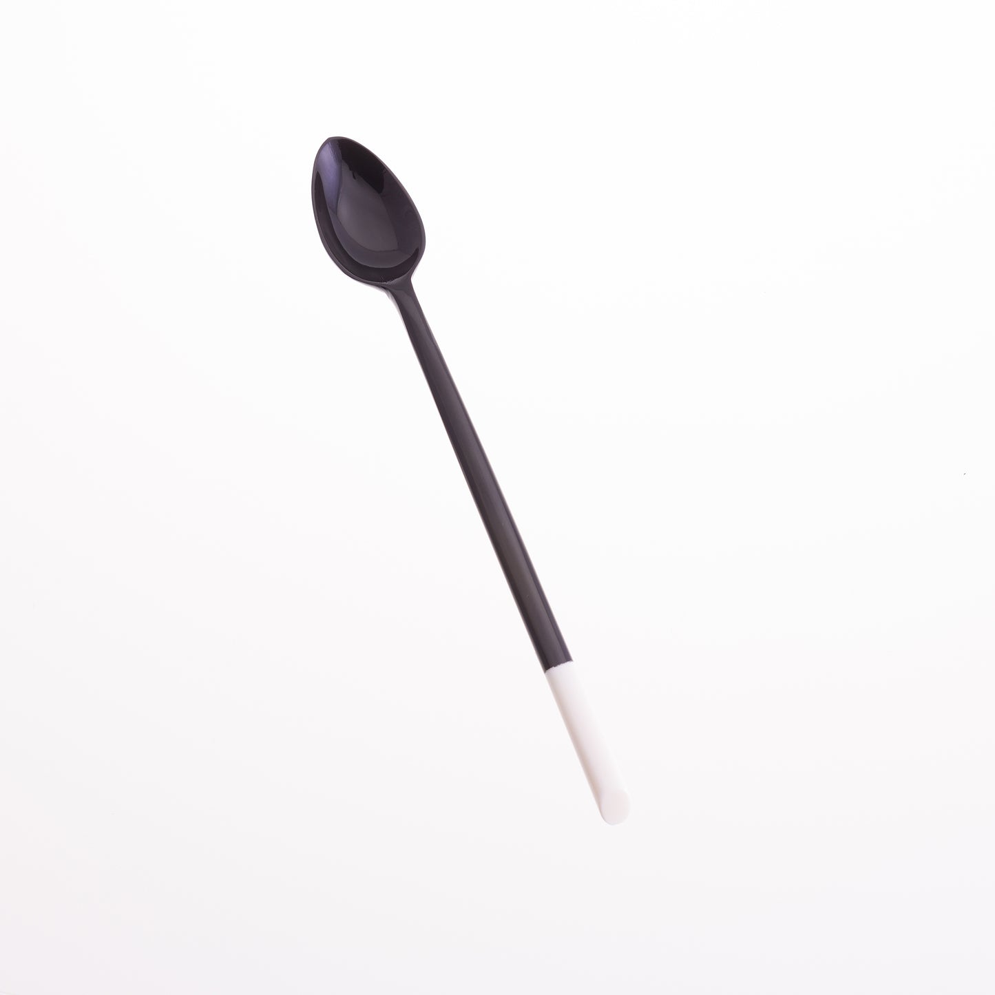 Long handled jam spoon made from black water buffalo horn with a bone tip.