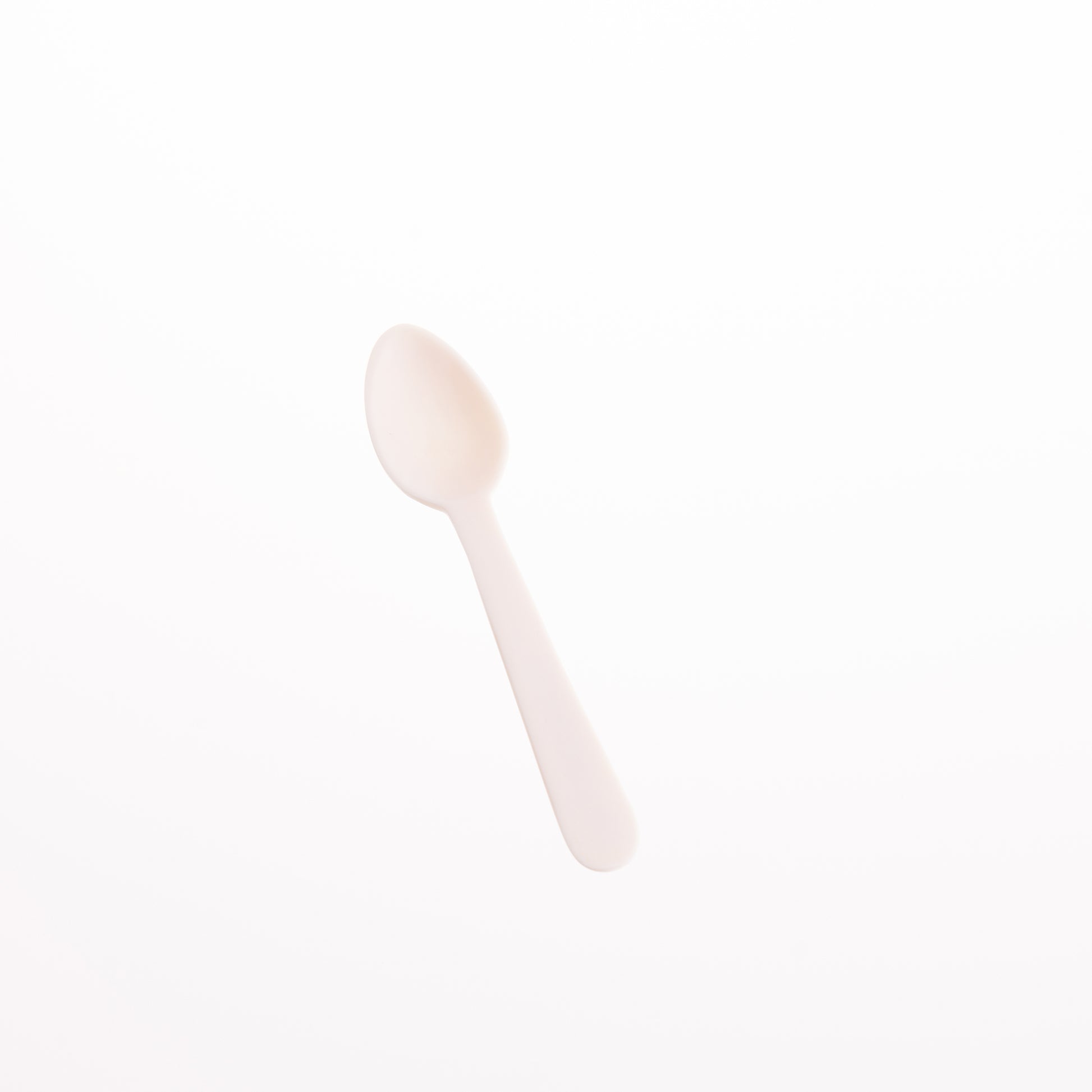 A white bone egg spoon