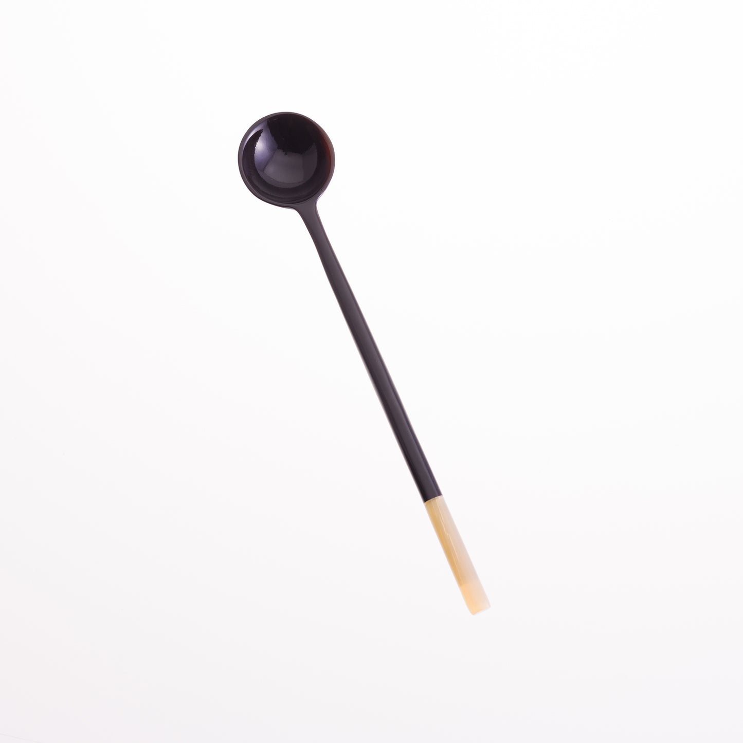 Long handled olive spoon made from black horn with a natural horn tip