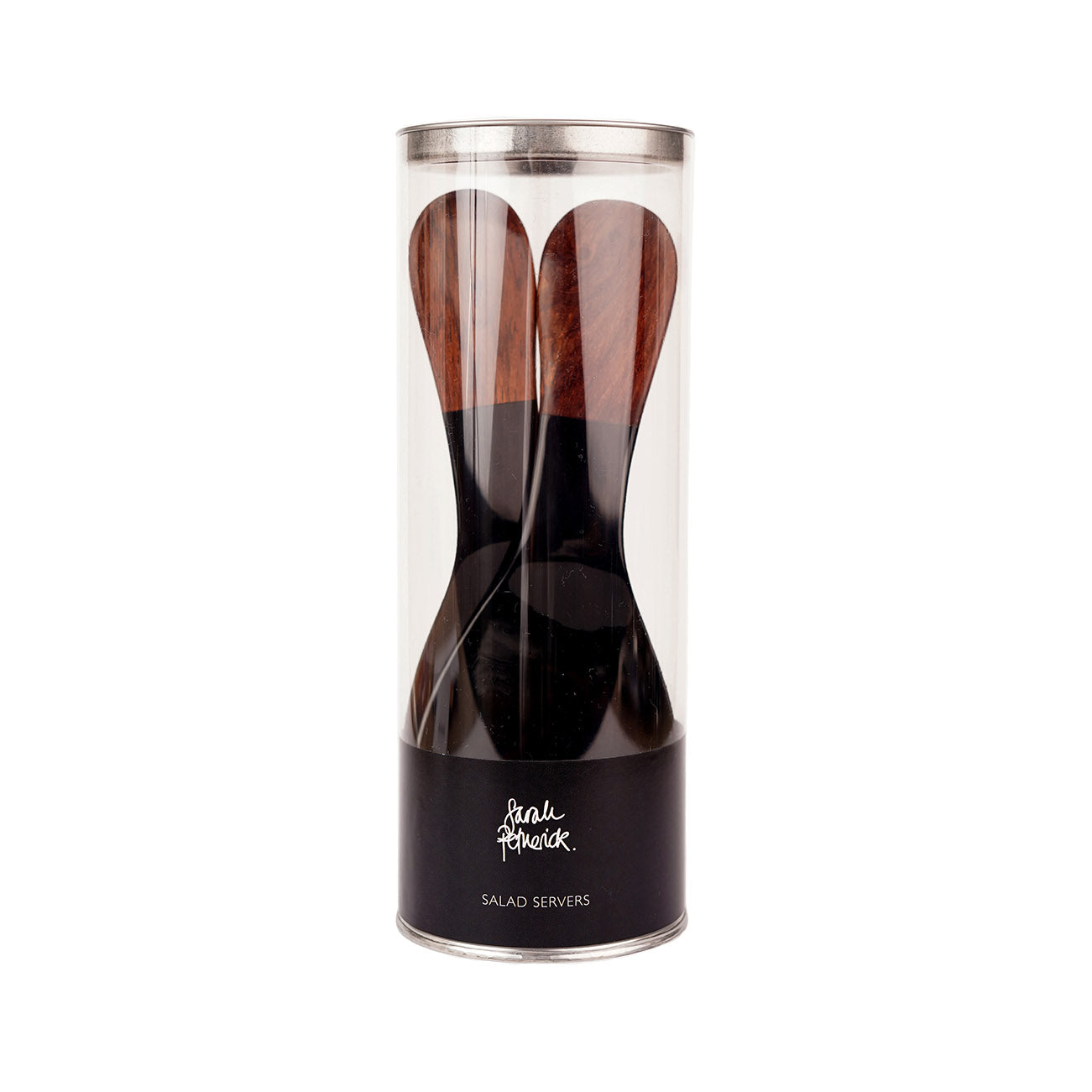 A pair of black water buffalo horn salad servers with rosewood handles, packaged in a clear tube