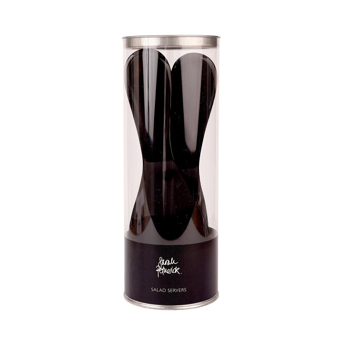 Pair of black horn salad servers in a clear tube