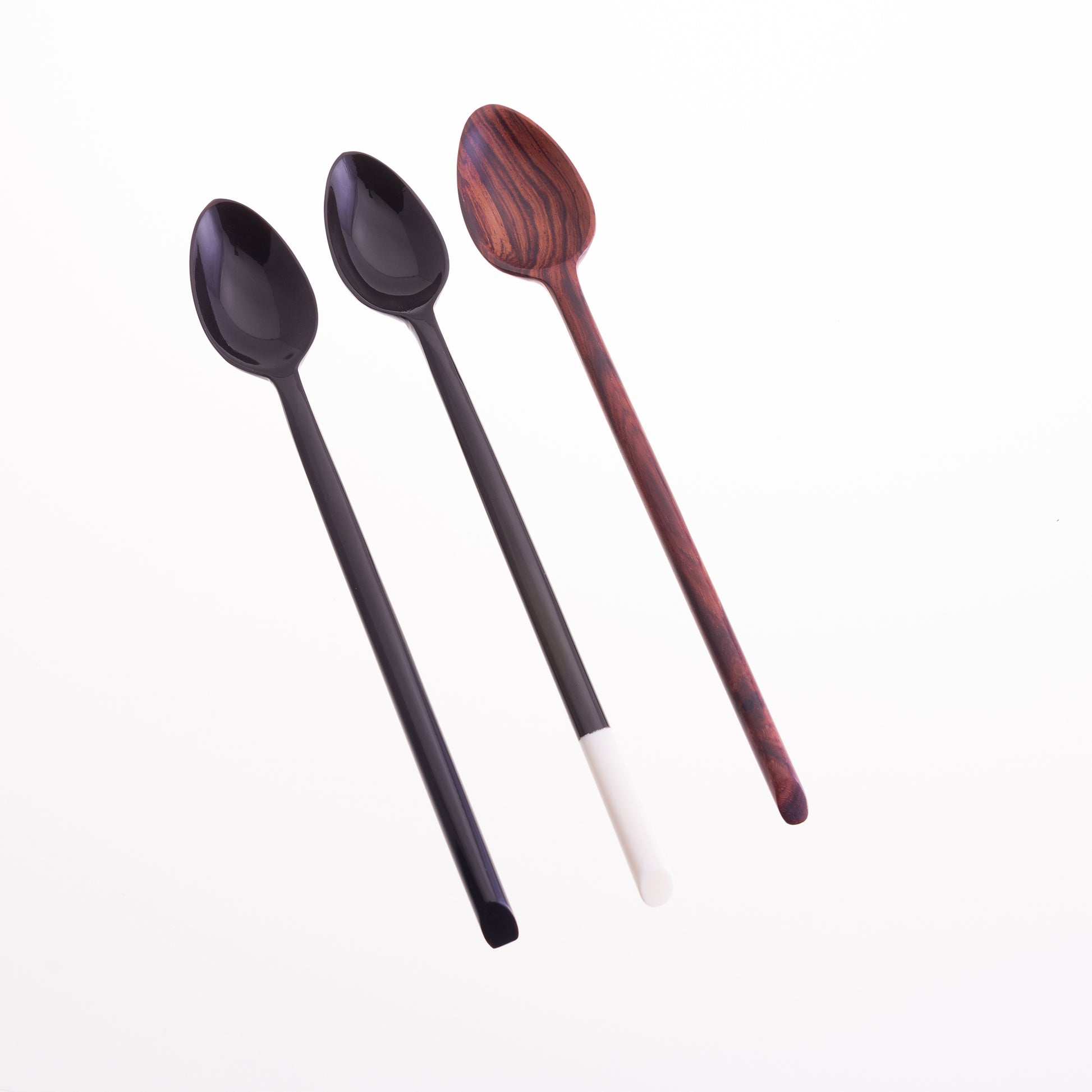 A set of 3 long handled jam spoons. The first is black horn, the second is black horn with a bone tip and the third is rosewood