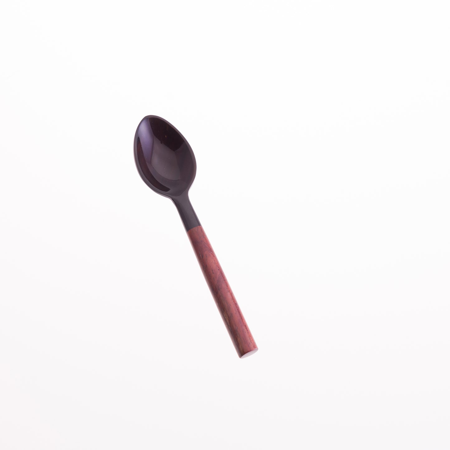 A black water buffalo horn egg spoon with a rosewood handle